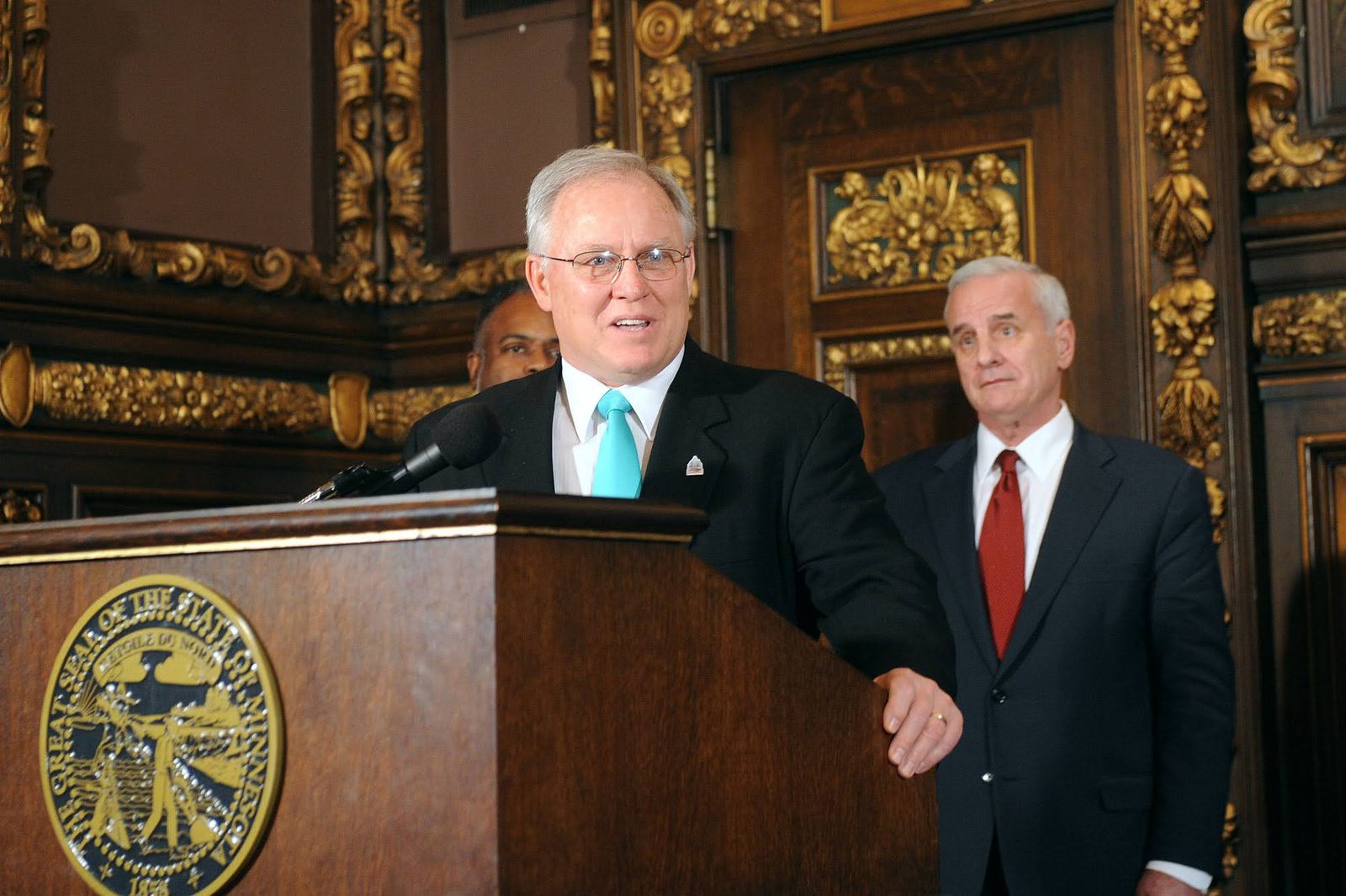 At the podium in the Minnesota Capitol